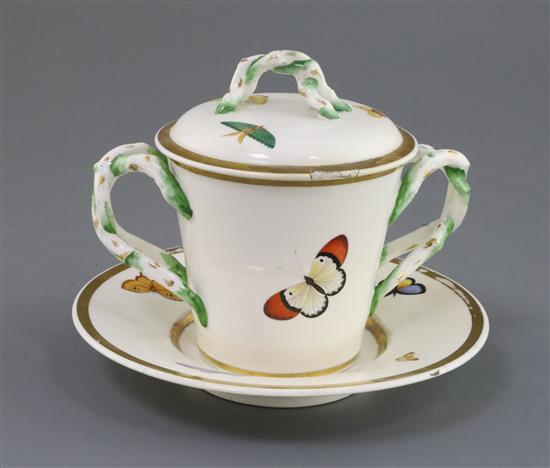 A rare Rockingham porcelain ornithological cup, cover and stand, c.1826-30, H. 14cm, faults